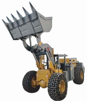 Mining loader with rock bucket
